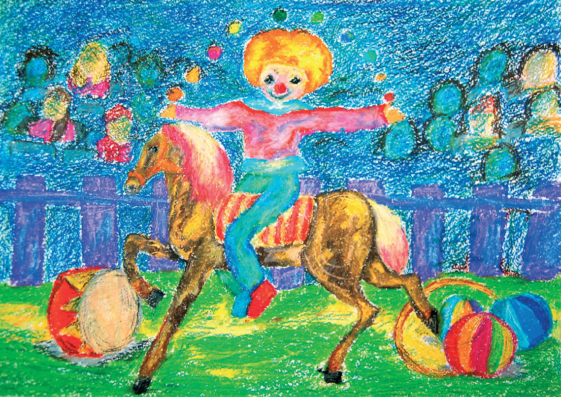 На манеже рыжий клоун